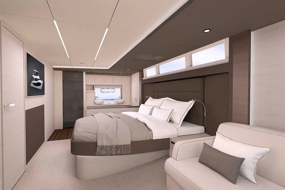 Luxurious bedroom with a double bed, modern decor, large windows, and a comfortable seating area showcasing elegant design.